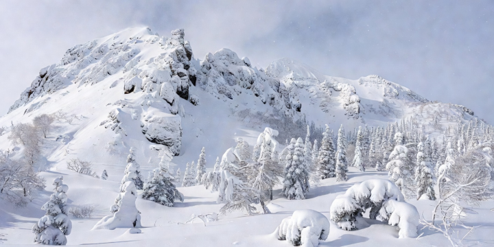 Snowbound volcanic terrain and alpine forest in northern Hokkaido